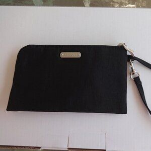 Baggallini black wristlet, nylon exterior and blue interior with zip around top